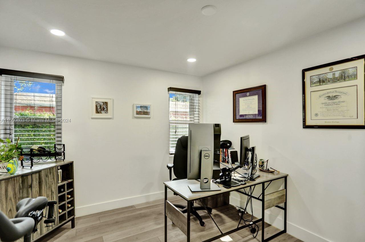 2800 Southwest 26th Street Miami, FL 33133 - Photo 53 of 72 a view of a workspace with furniture and a window