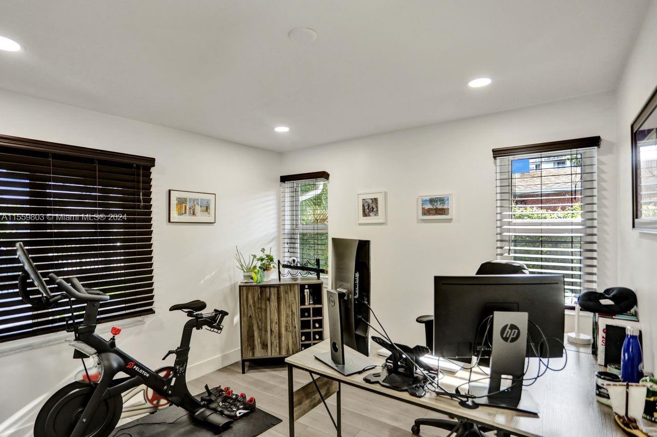 2800 Southwest 26th Street Miami, FL 33133 - Photo 54 of 72 a view of a workspace with furniture and a window