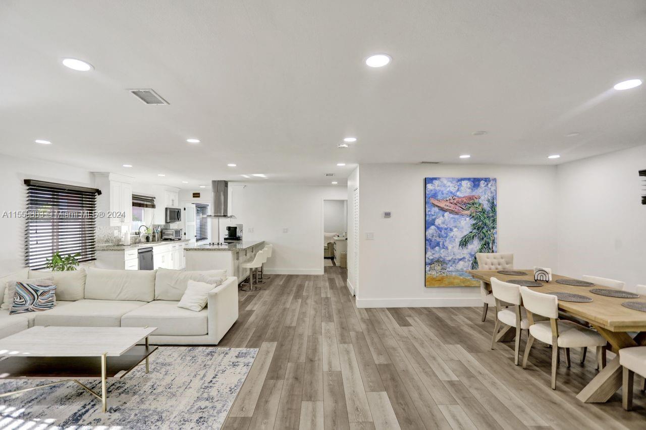 2800 Southwest 26th Street Miami, FL 33133 - Photo 55 of 72 a living room with furniture and a wooden floor