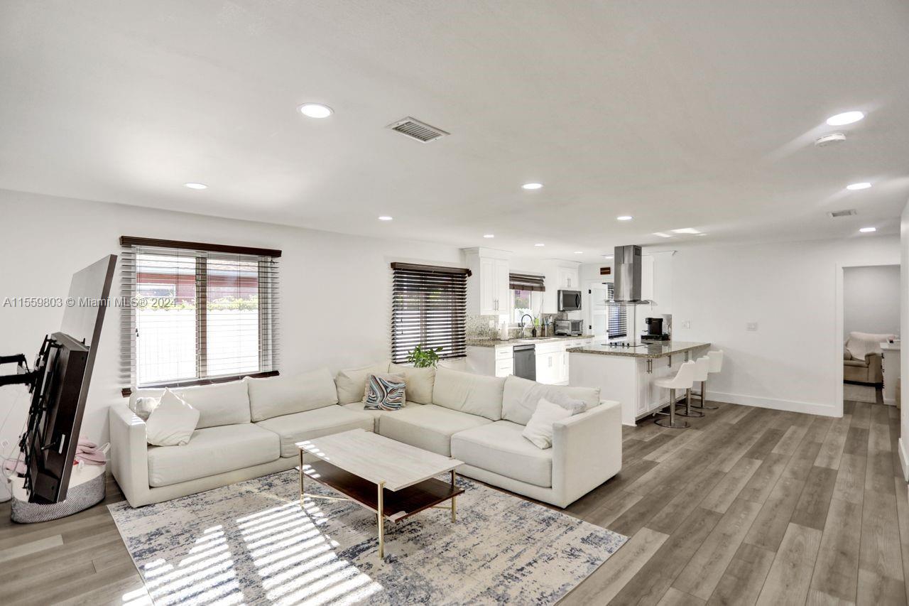 2800 Southwest 26th Street Miami, FL 33133 - Photo 56 of 72 a living room with furniture and a large window