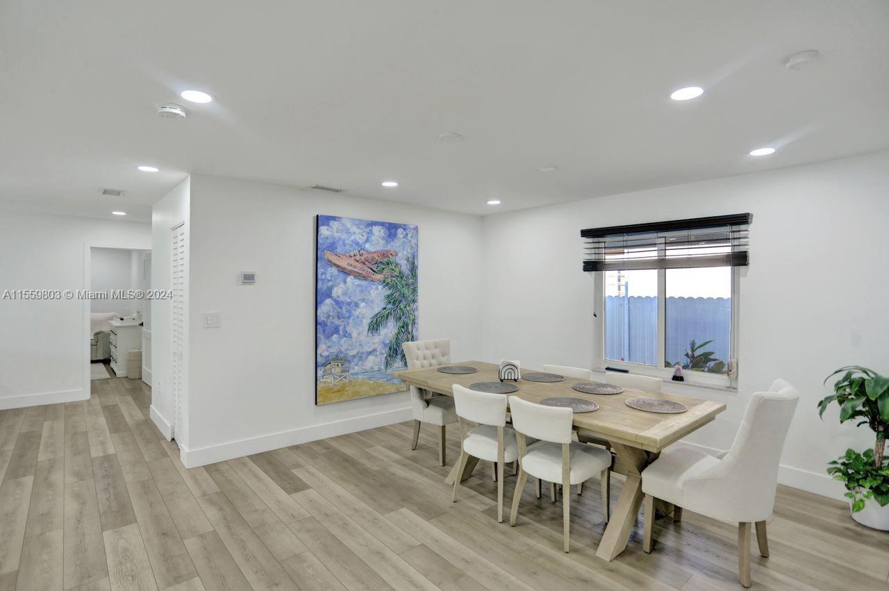 2800 Southwest 26th Street Miami, FL 33133 - Photo 57 of 72 a dining room with furniture and window