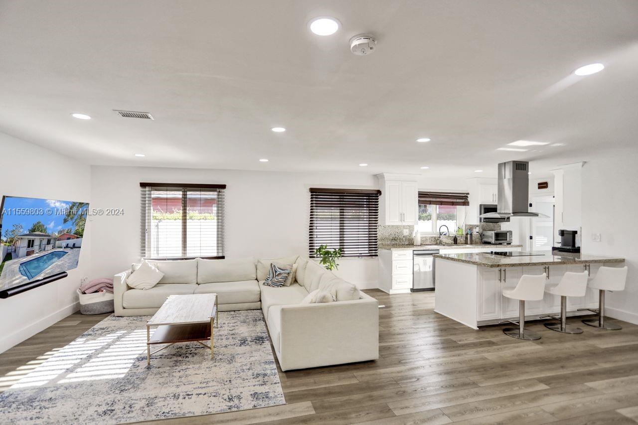 2800 Southwest 26th Street Miami, FL 33133 - Photo 59 of 72 a living room with furniture and view of kitchen
