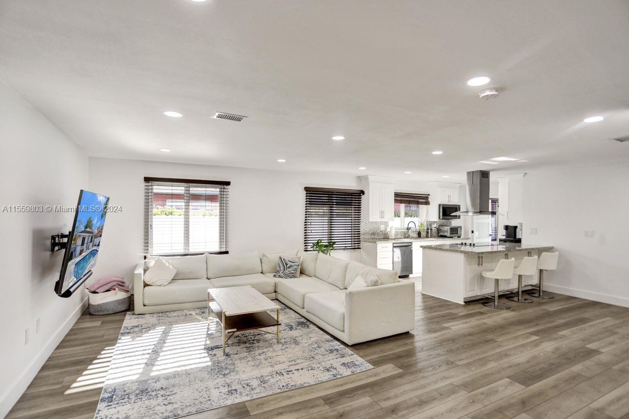 2800 Southwest 26th Street Miami, FL 33133 - Photo 60 of 72 a living room with furniture flat screen tv and window