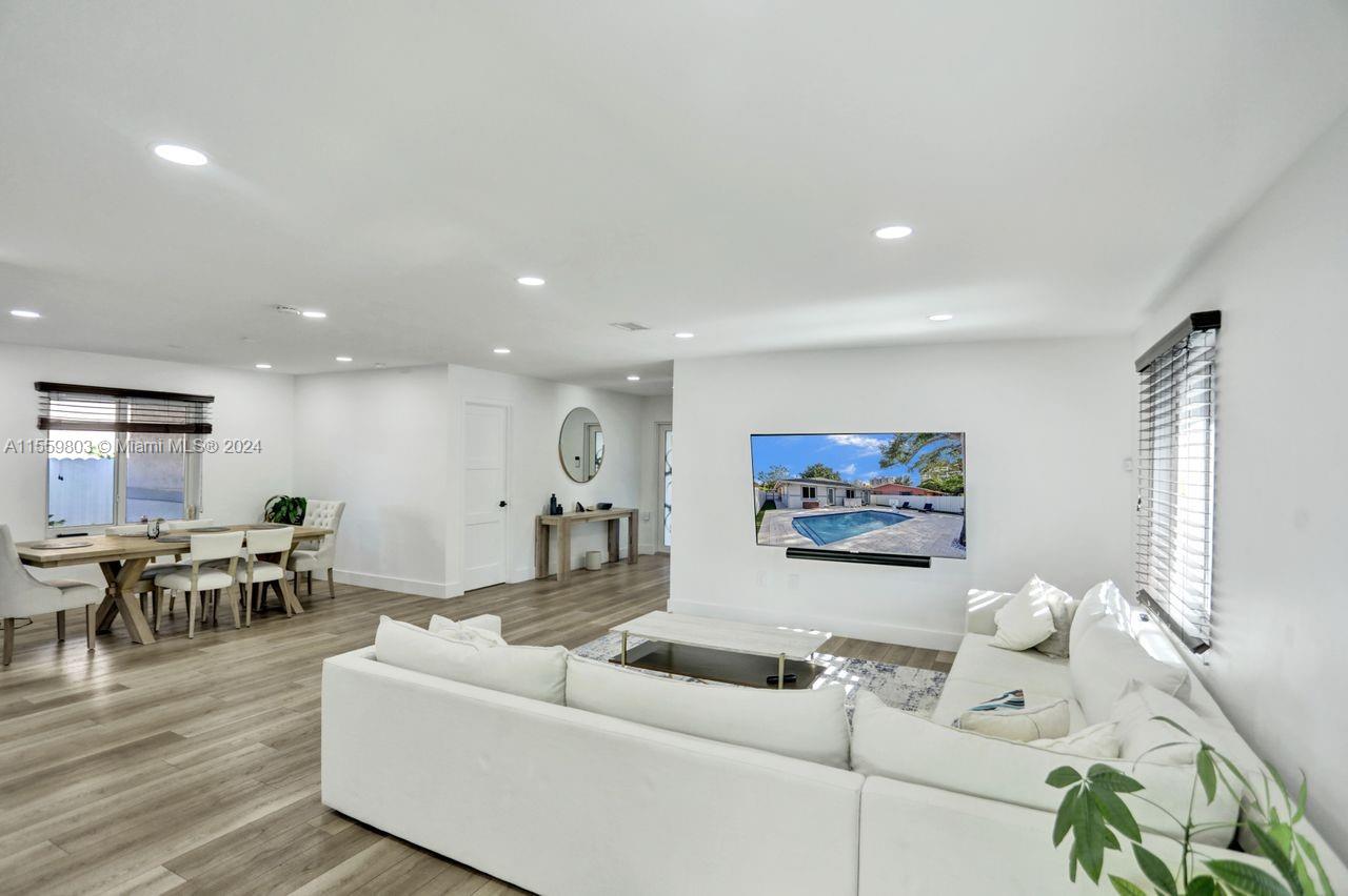 2800 Southwest 26th Street Miami, FL 33133 - Photo 63 of 72 a living room with furniture and wooden floor