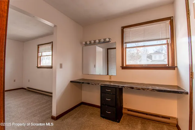 an empty room with windows