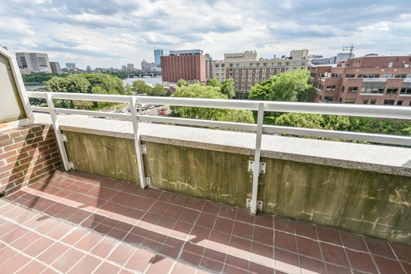 a view of a balcony with city view