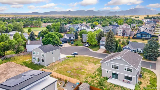an aerial view of residential house with outdoor space