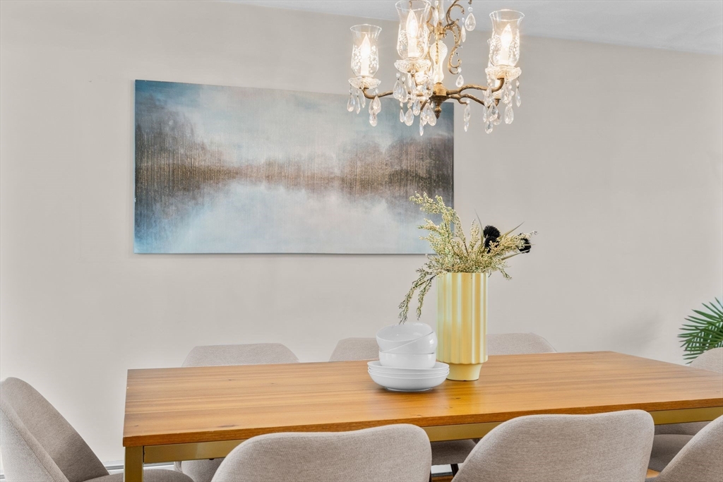 5 Brae Circle Woburn, MA 01801 - Photo 14 of 40 a vase of flowers sitting on a table