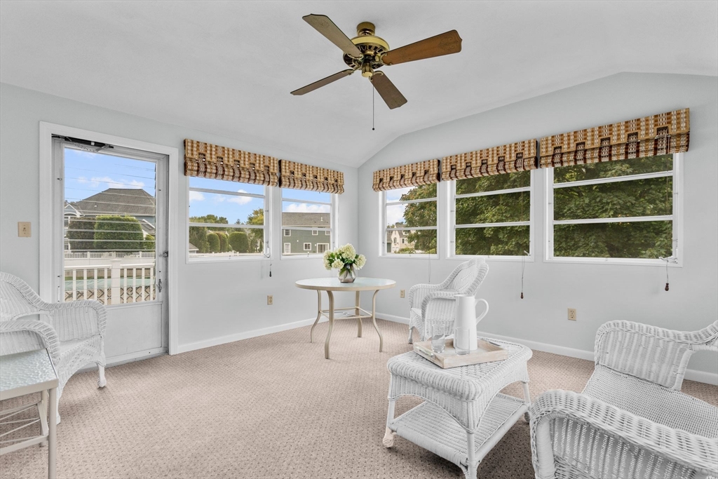 5 Brae Circle Woburn, MA 01801 - Photo 16 of 40 a living room with furniture and a window