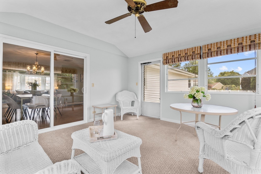 5 Brae Circle Woburn, MA 01801 - Photo 17 of 40 a living room with furniture and a large window