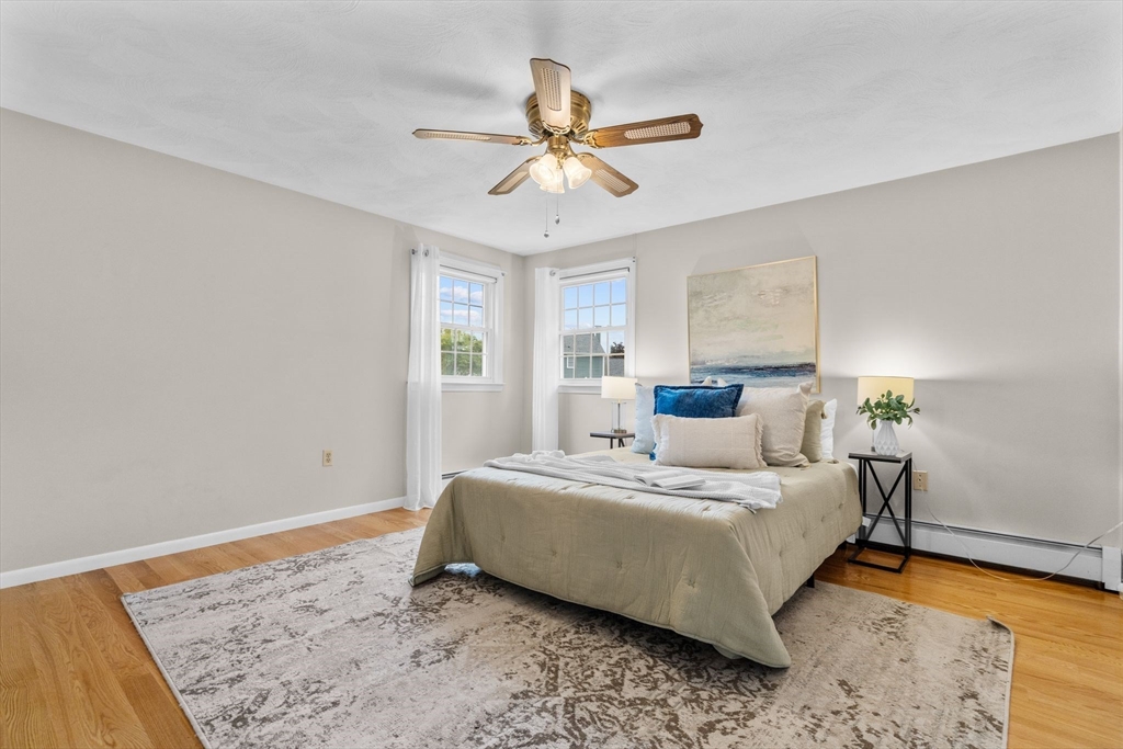 5 Brae Circle Woburn, MA 01801 - Photo 18 of 40 a bedroom with a bed and window