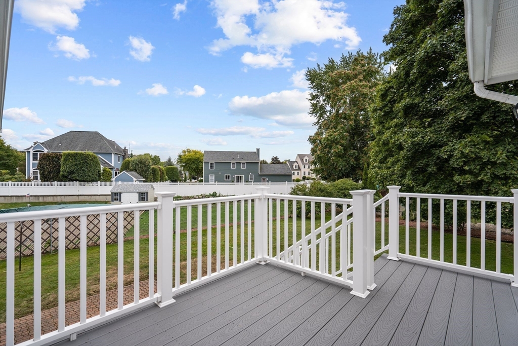 5 Brae Circle Woburn, MA 01801 - Photo 34 of 40 a view of balcony with wooden floor and fence