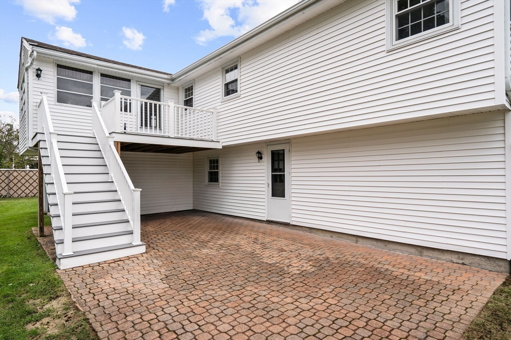 5 Brae Circle Woburn, MA 01801 - Photo 35 of 40 a view of a house with a yard