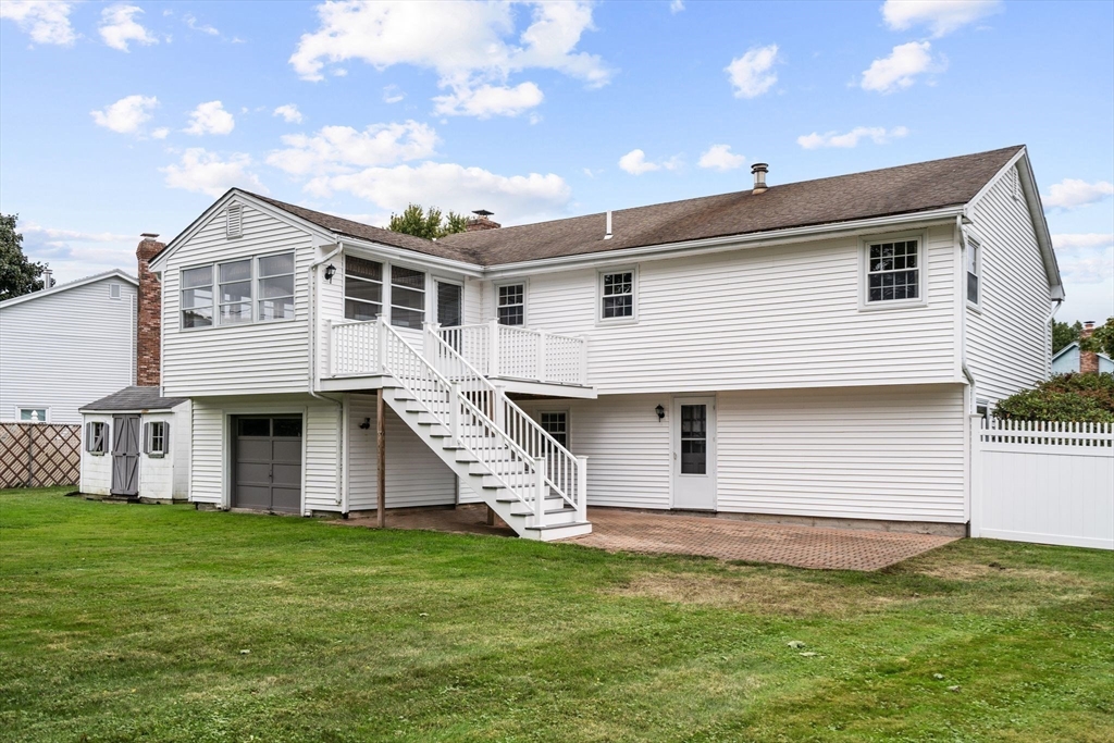 5 Brae Circle Woburn, MA 01801 - Photo 37 of 40 a front view of house with yard and garage