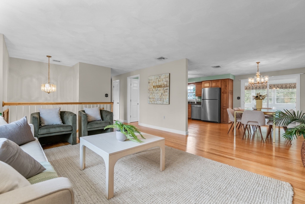 5 Brae Circle Woburn, MA 01801 - Photo 9 of 40 a living room with furniture and wooden floor