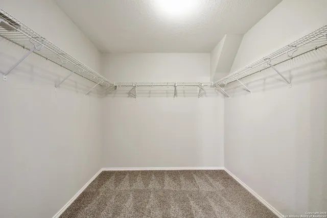 a view of a room with racks on the wall