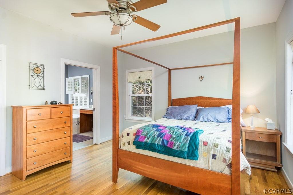 12620 Singer Road Midlothian, VA 23112 - Photo 14 of 28 a bedroom with a bed and a dresser