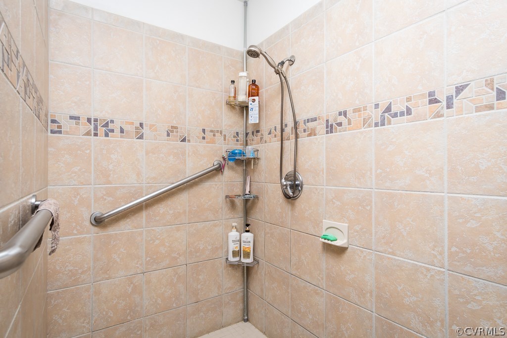 12620 Singer Road Midlothian, VA 23112 - Photo 16 of 28 a bathroom with a shower