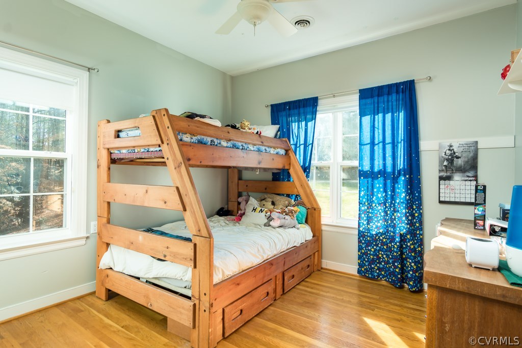 12620 Singer Road Midlothian, VA 23112 - Photo 17 of 28 a bedroom with a bed and a window