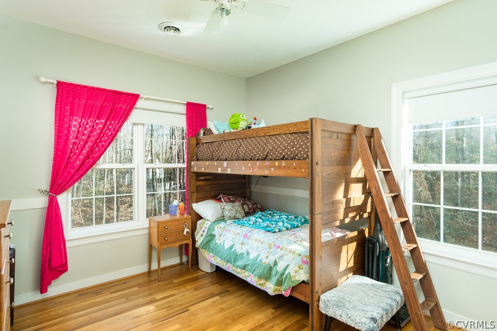 12620 Singer Road Midlothian, VA 23112 - Photo 19 of 28 a view of a bedroom with furniture and a window
