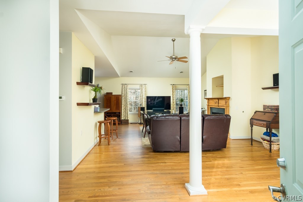 12620 Singer Road Midlothian, VA 23112 - Photo 2 of 28 a living room with furniture and a flat screen tv
