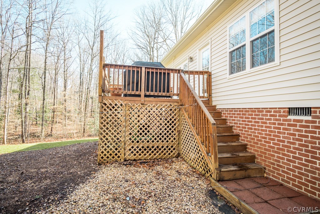 12620 Singer Road Midlothian, VA 23112 - Photo 23 of 28 a view of a pathway of a house with wooden fence