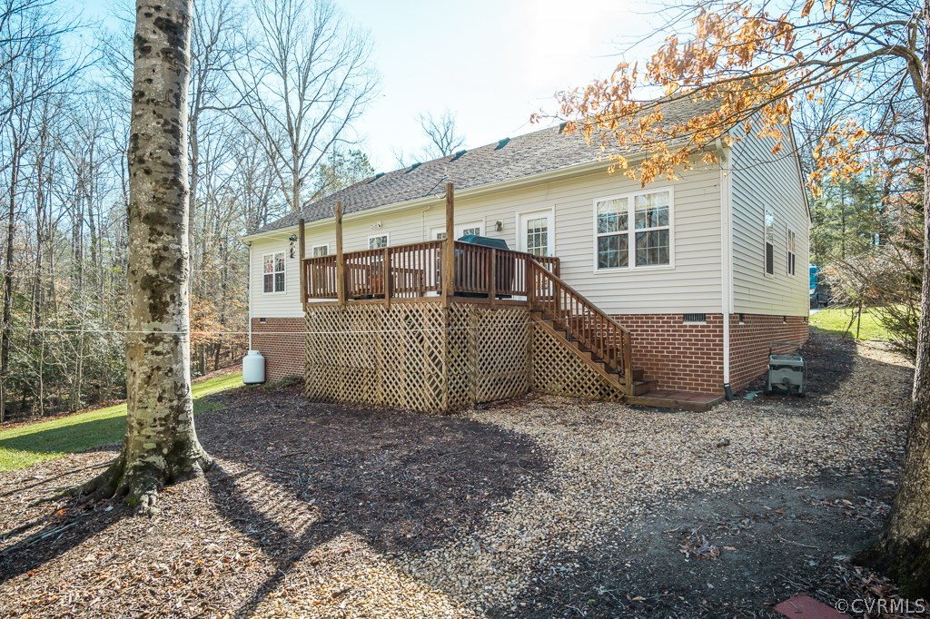12620 Singer Road Midlothian, VA 23112 - Photo 25 of 28 a view of a house with a yard