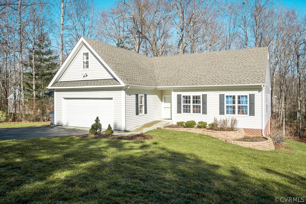 12620 Singer Road Midlothian, VA 23112 - Photo 28 of 28 a front view of a house with a yard