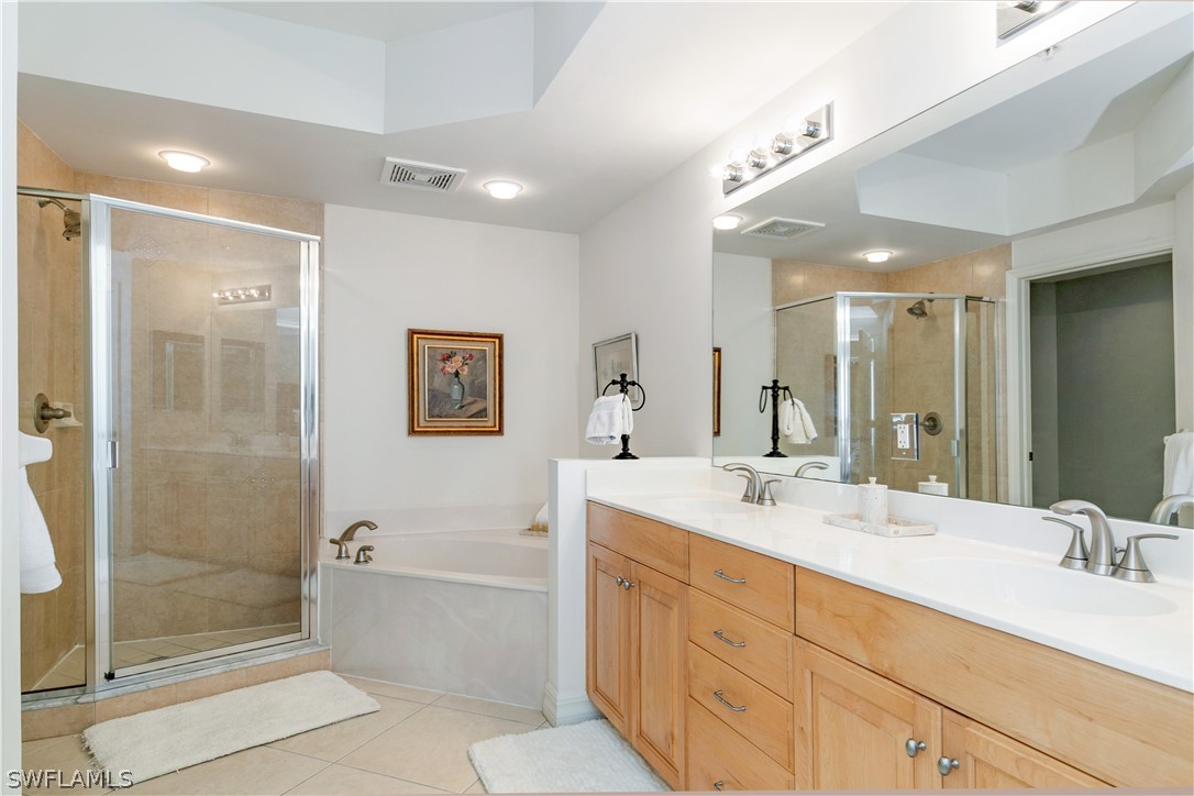 2797 First Street, Unit 1806 Fort Myers, FL 33916 - Photo 15 of 34 a bathroom with a double vanity sink mirror double and shower