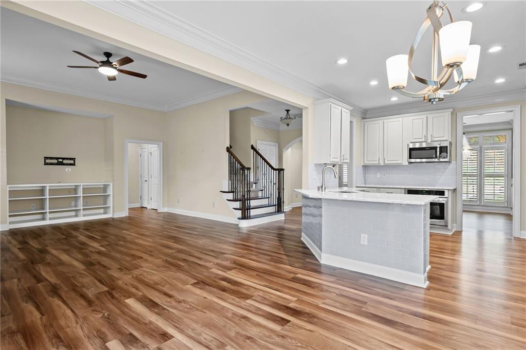 589 Lawton Bridge Road Southwest Smyrna, GA 30082 - Photo 17 of 52 a view of kitchen and hall with wooden floor