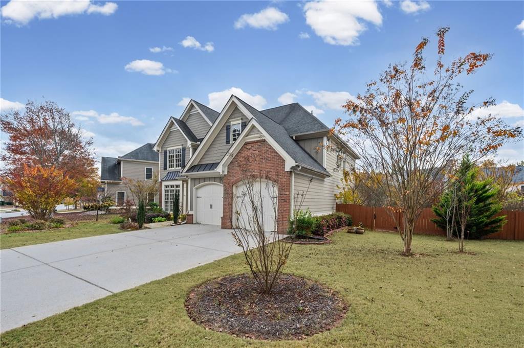 589 Lawton Bridge Road Southwest Smyrna, GA 30082 - Photo 2 of 52 a front view of a house with a yard