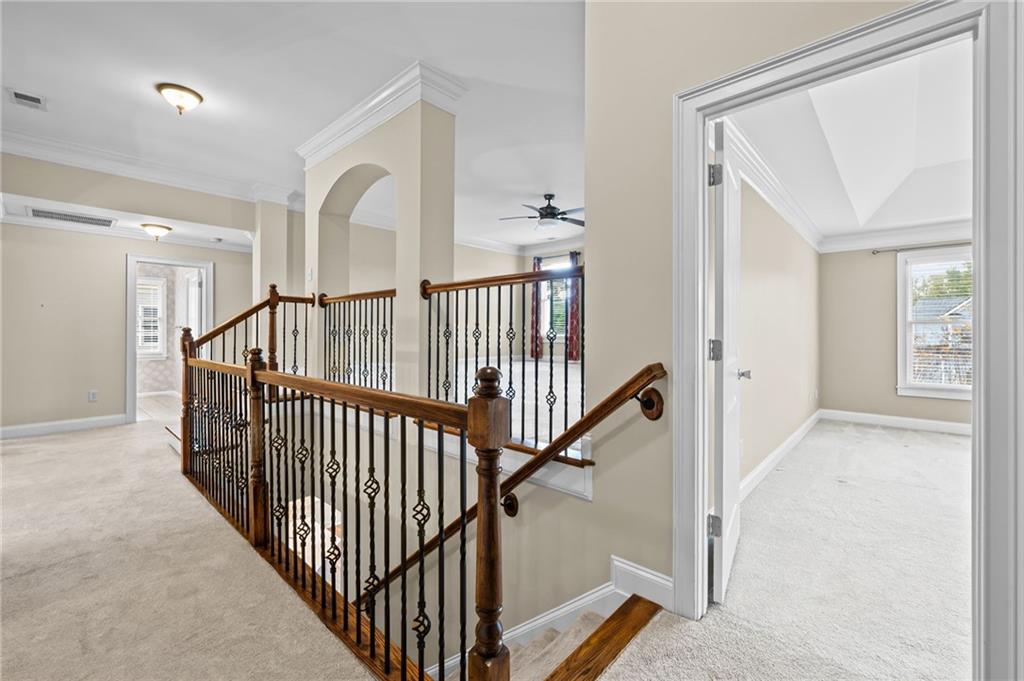 589 Lawton Bridge Road Southwest Smyrna, GA 30082 - Photo 25 of 52 a view of a hallway with windows and stairs