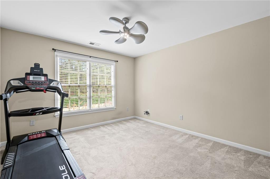 589 Lawton Bridge Road Southwest Smyrna, GA 30082 - Photo 36 of 52 a view of a room with gym equipment