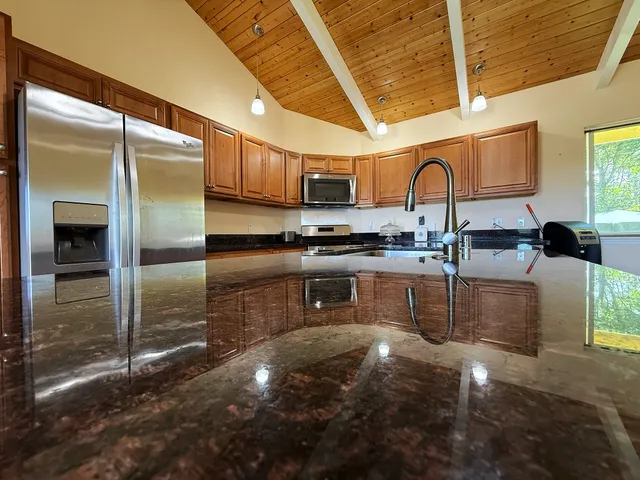 a room with closet and ceiling fan