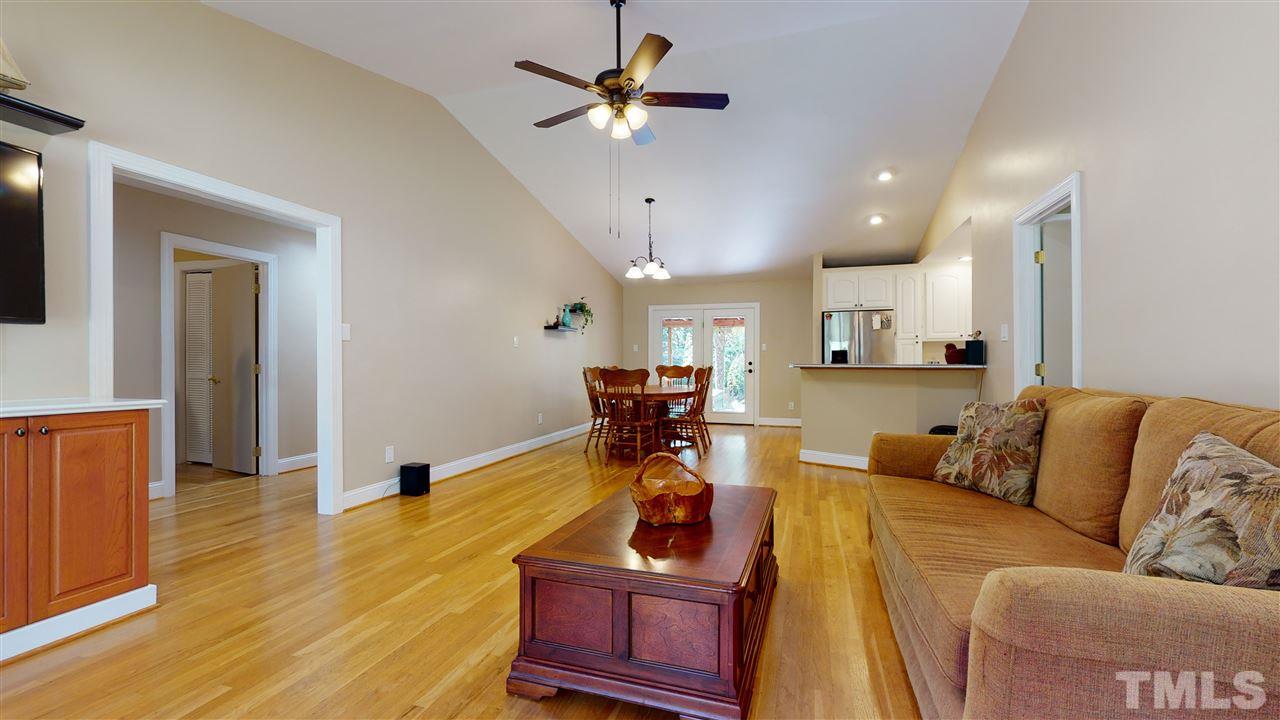 5901 Crabapple Road Durham, NC 27712 - Photo 10 of 20 a living room with furniture