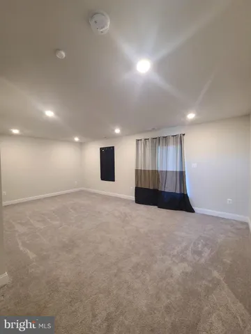 a view of a room with an empty space