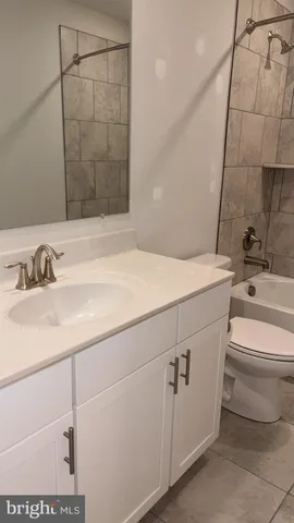 a view of a terrace with wooden floor and city view