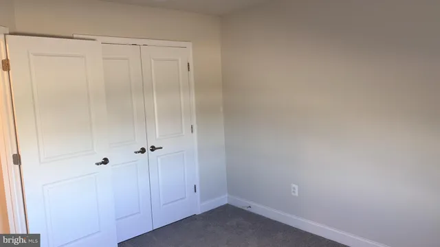 a view of swimming pool with outdoor seating and city view