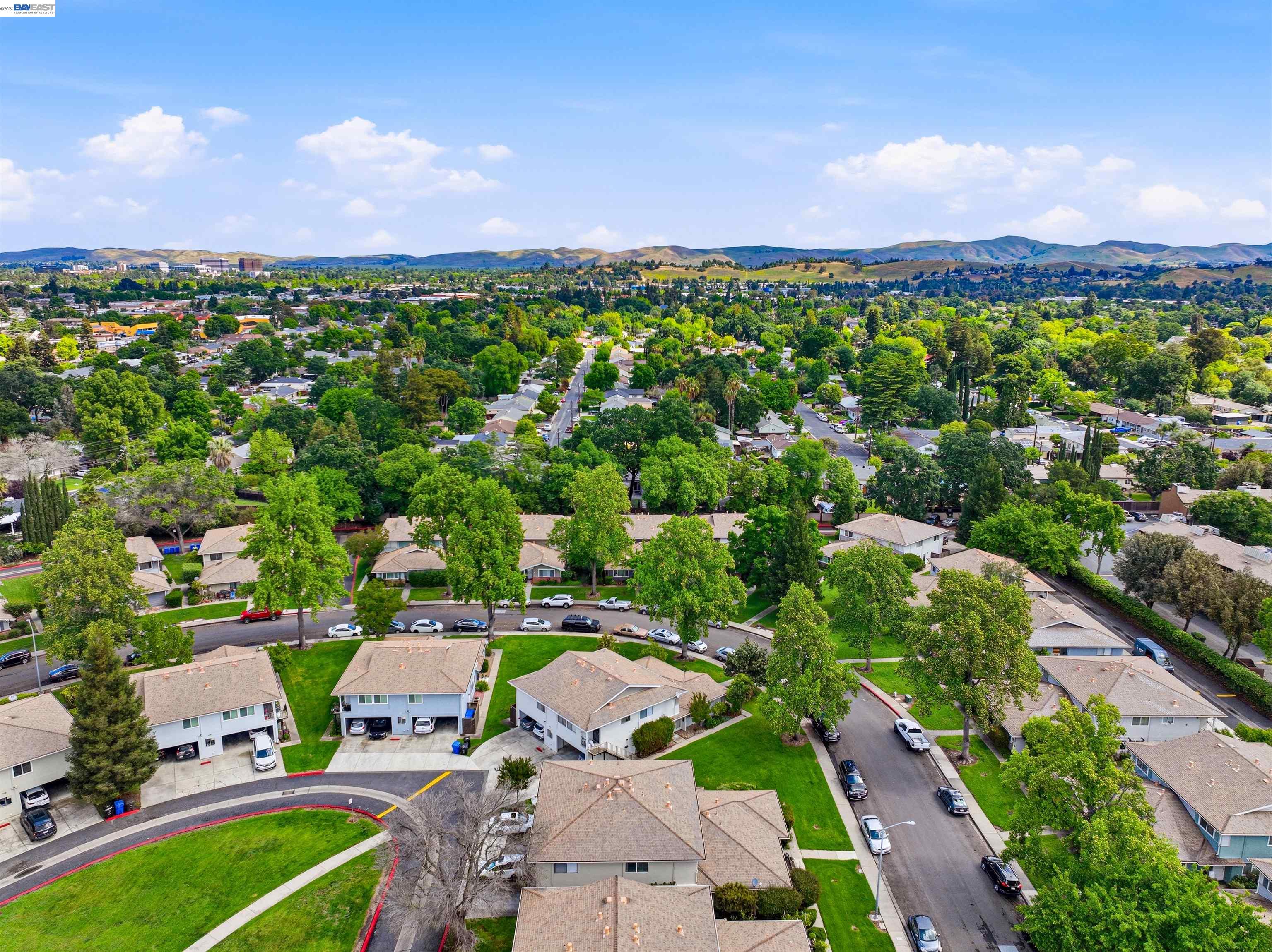 1494 Del Rio Circle, Unit D Concord, CA 94518 - Photo 7 of 8 an aerial view of a houses with a garden
