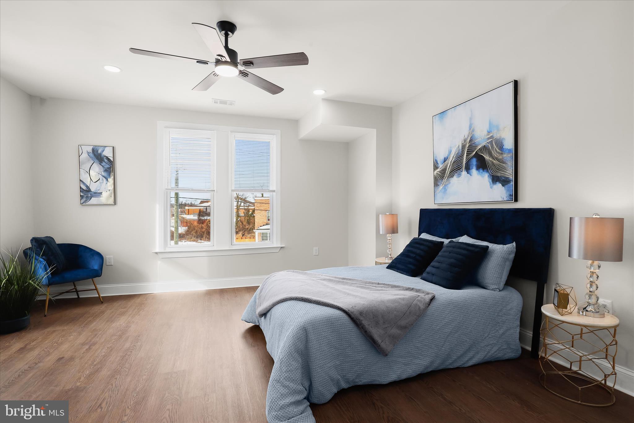 701 East 43rd Street Baltimore, MD 21212 - Photo 26 of 47 a bedroom with a bed and a painting on the wall