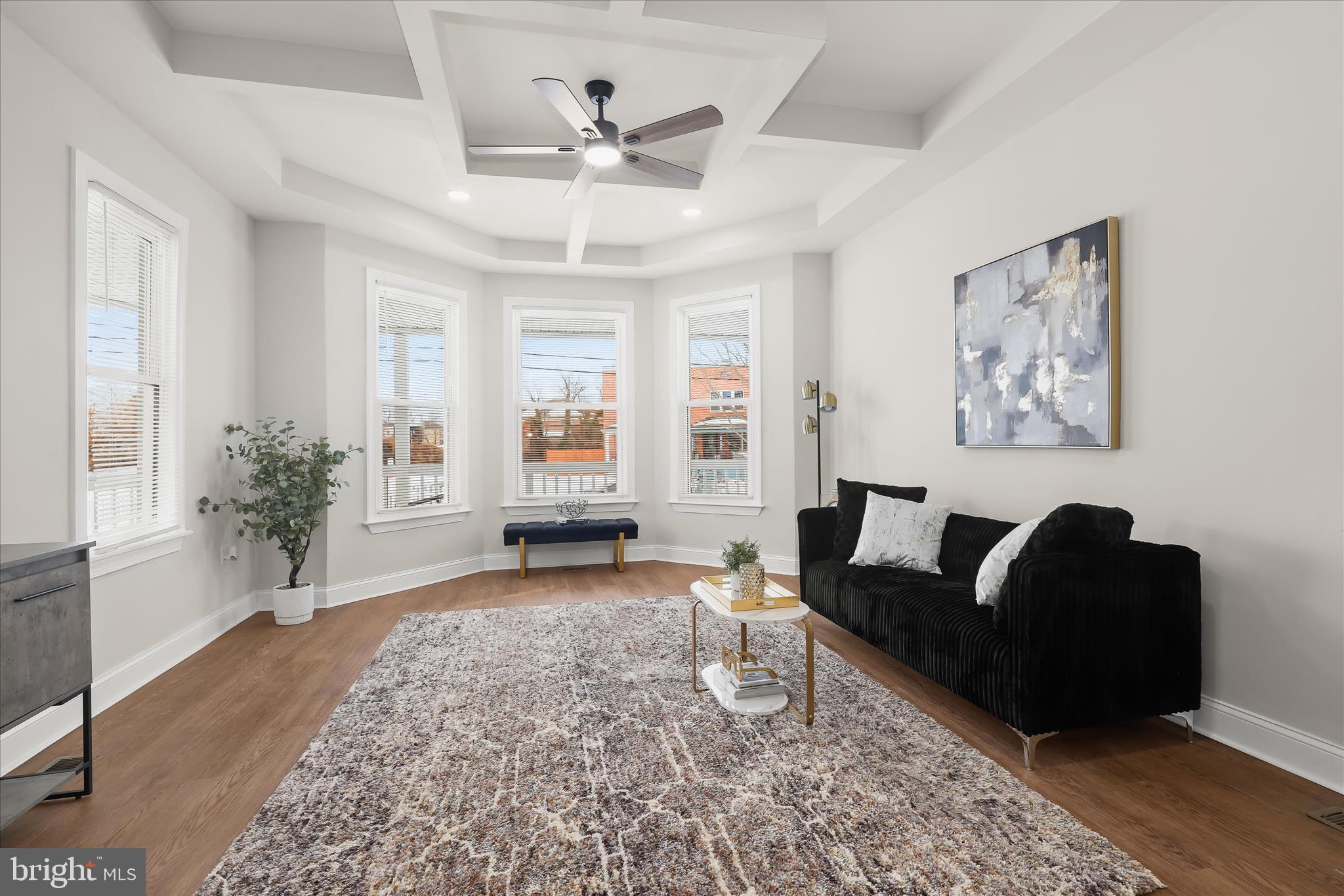 701 East 43rd Street Baltimore, MD 21212 - Photo 6 of 47 a living room with furniture and a large window