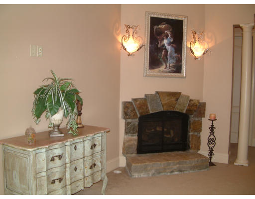 4 Shady Lane Walpole, MA 02081 - Photo 13 of 25 a living room with furniture and a fireplace