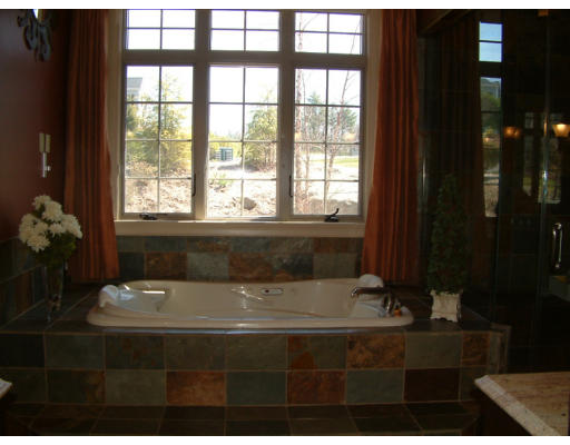 4 Shady Lane Walpole, MA 02081 - Photo 15 of 25 a bathroom with a bathtub and a sink