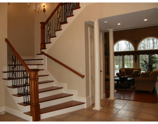 4 Shady Lane Walpole, MA 02081 - Photo 2 of 25 a view of entryway and hall with wooden floor