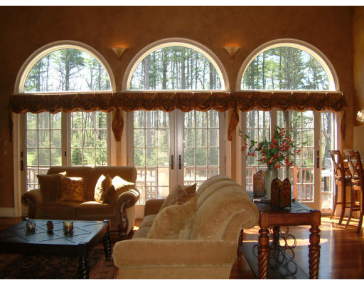4 Shady Lane Walpole, MA 02081 - Photo 9 of 25 a living room with windows and ceiling windows