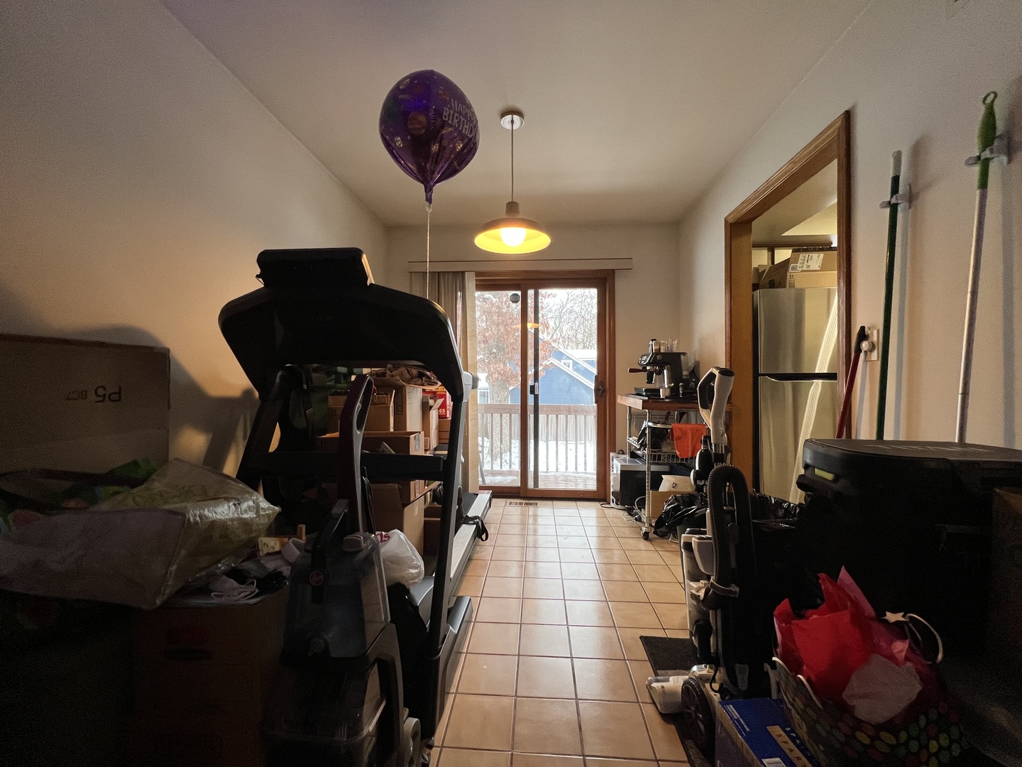 509 East Lake Avenue, Unit B Round Lake Beach, IL 60073 - Photo 5 of 18 a living room with furniture and a chandelier