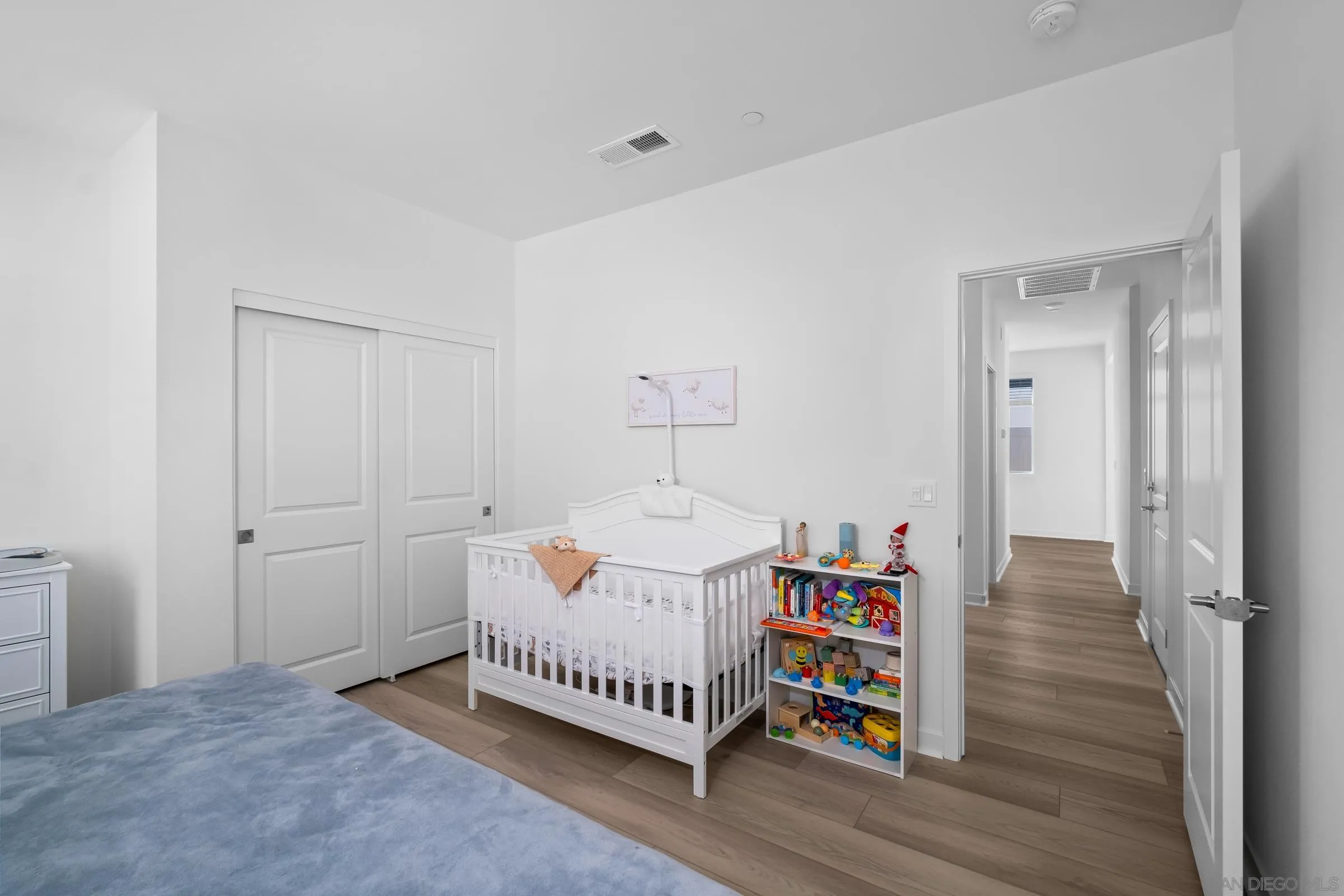 35164 Orchard Trail Fallbrook, CA 92028 - Photo 11 of 52 a room with furniture and baby crib