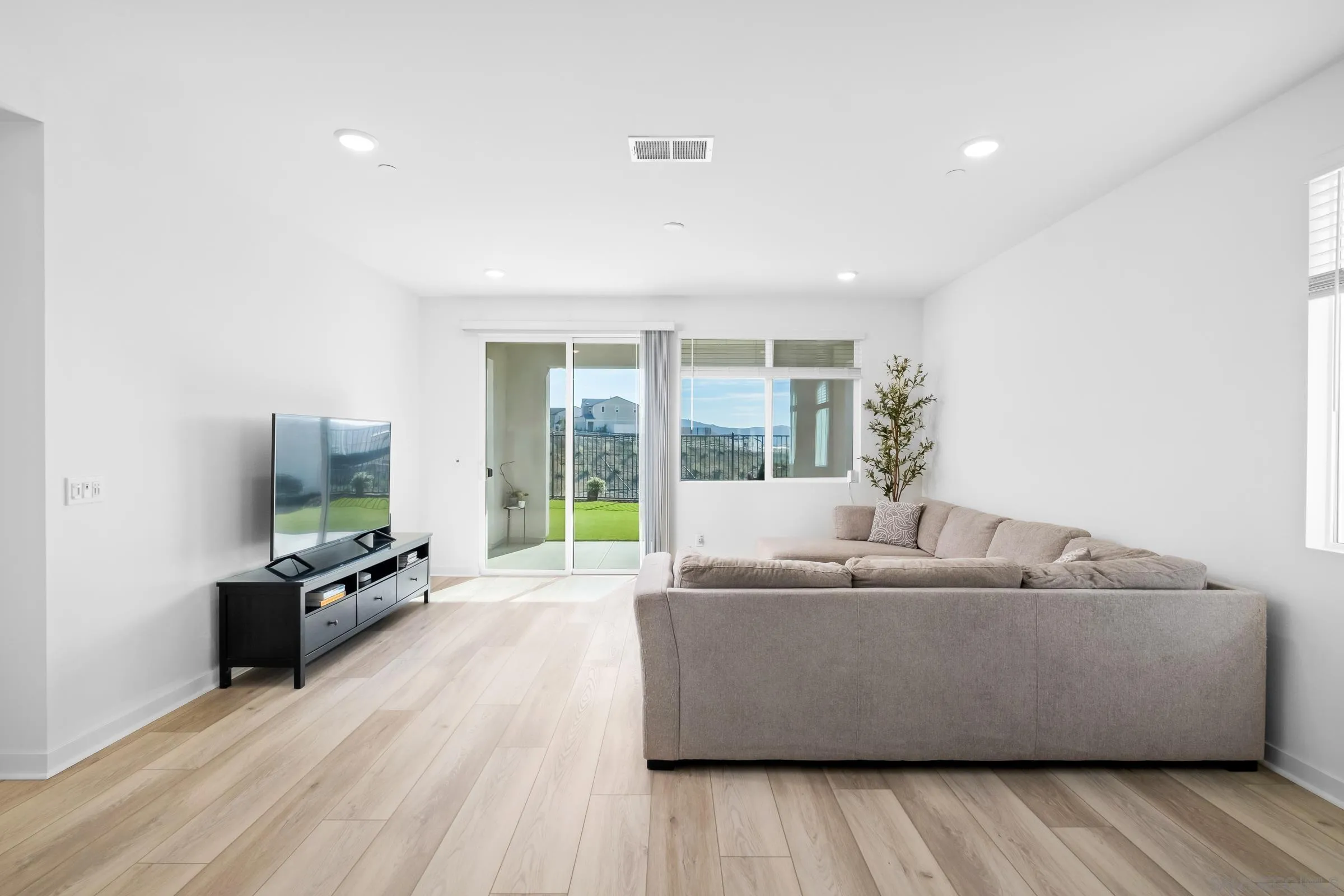 35164 Orchard Trail Fallbrook, CA 92028 - Photo 18 of 52 a living room with furniture and a flat screen tv
