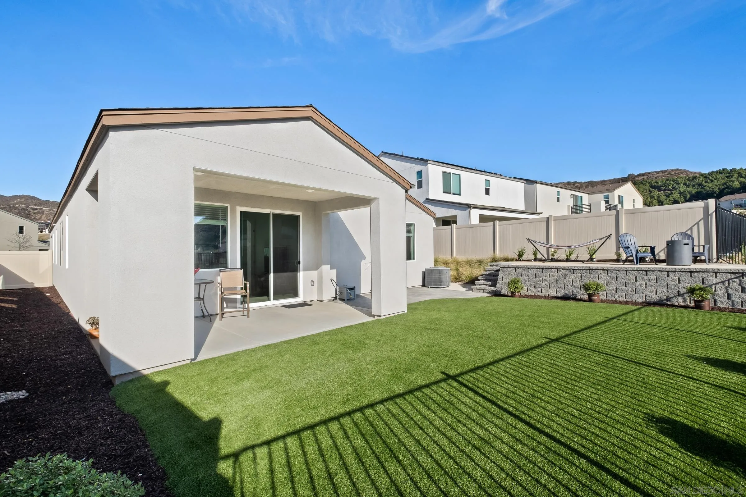 35164 Orchard Trail Fallbrook, CA 92028 - Photo 27 of 52 a view of a house with backyard porch and sitting area