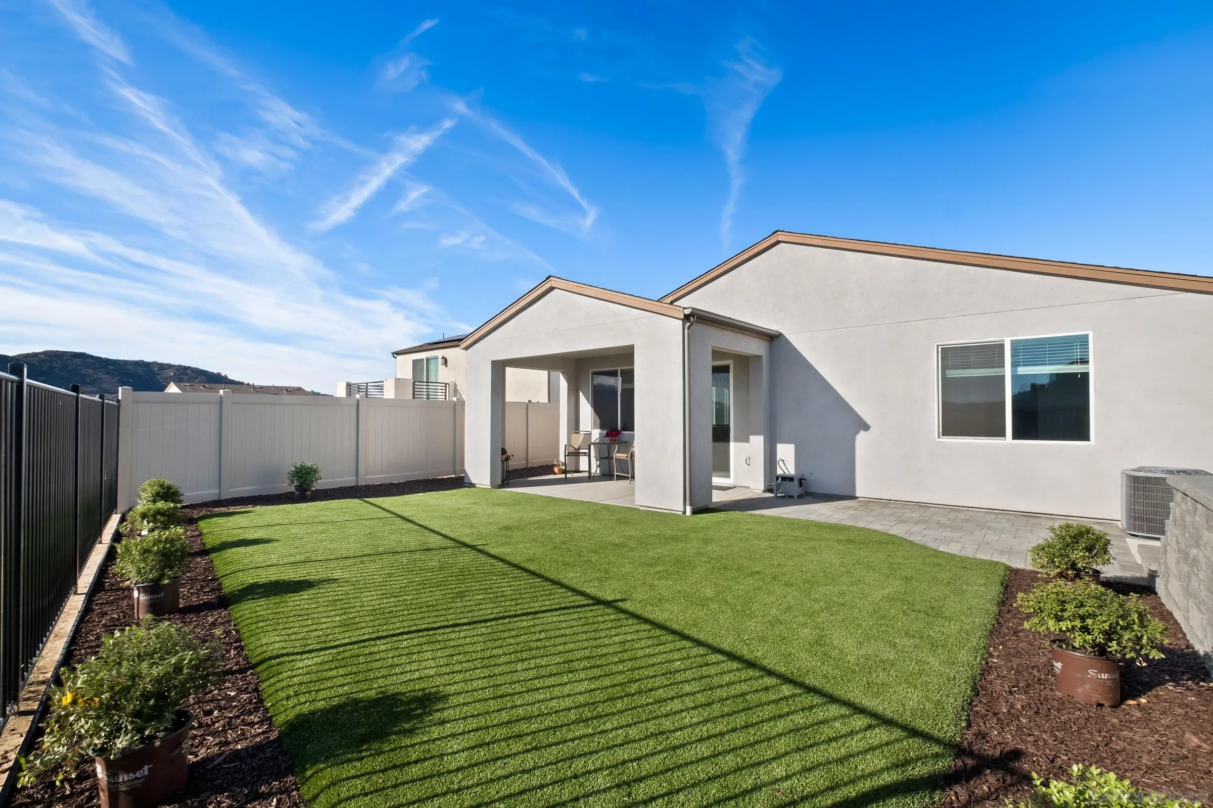 35164 Orchard Trail Fallbrook, CA 92028 - Photo 28 of 52 a front view of a house with garden
